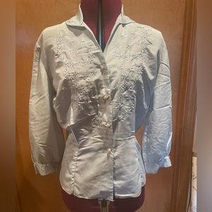 Antique silk top with 3/4 sleeves. Pale blue with metallic embroidery. Size 32